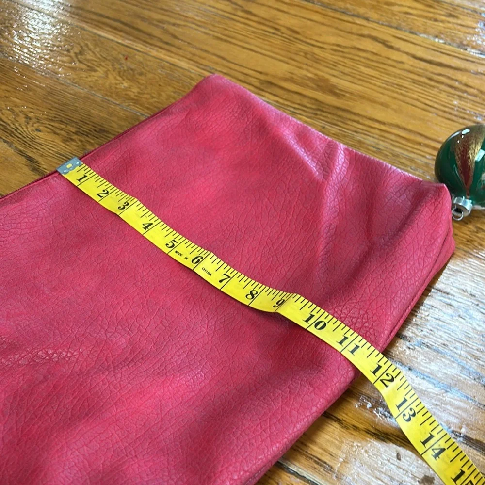 Free People red faux pebble leather travel zip bag.  Red. Approximately 11”X14”.